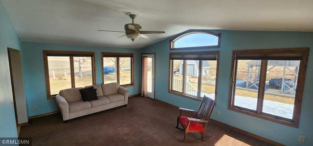 sunroom / solarium featuring a ceiling fan and vaulted ceiling