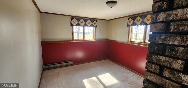 unfurnished room with baseboards, a baseboard heating unit, carpet, and ornamental molding