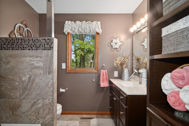 full bathroom with vanity, toilet, baseboards, and visible vents