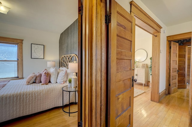 bedroom featuring light wood-style flooring