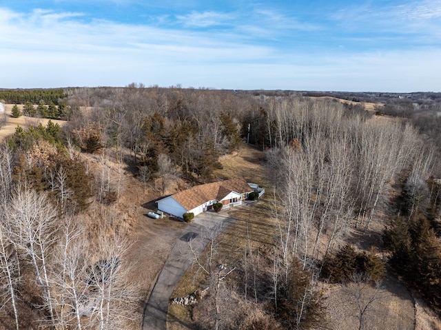 aerial view featuring a view of trees