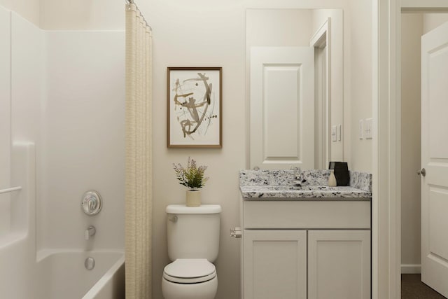 full bath featuring vanity, shower / tub combo, and toilet