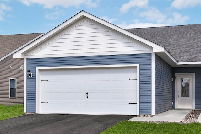 garage with driveway