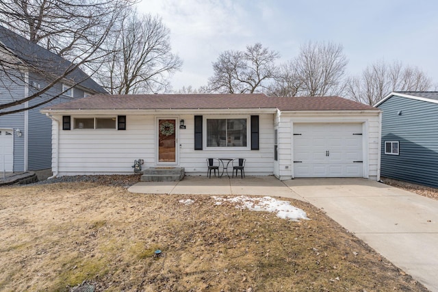 view of front of house featuring driveway and an attached garage