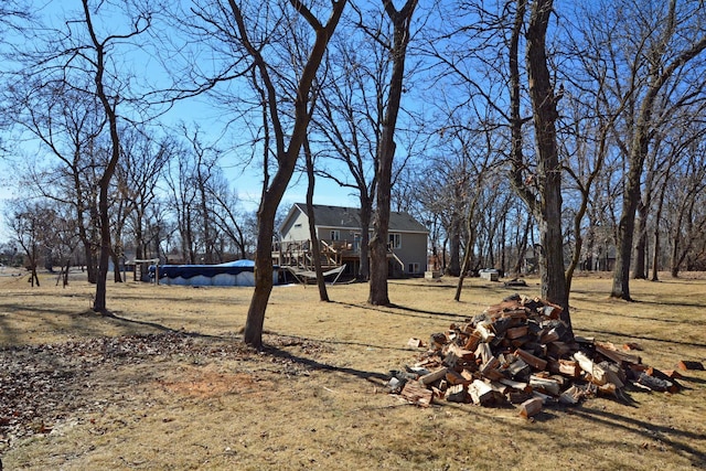 view of yard featuring a wooden deck