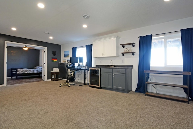 interior space featuring a wealth of natural light, wine cooler, and recessed lighting