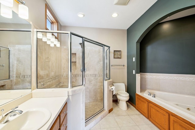 full bathroom with tile patterned floors, a stall shower, toilet, and vanity