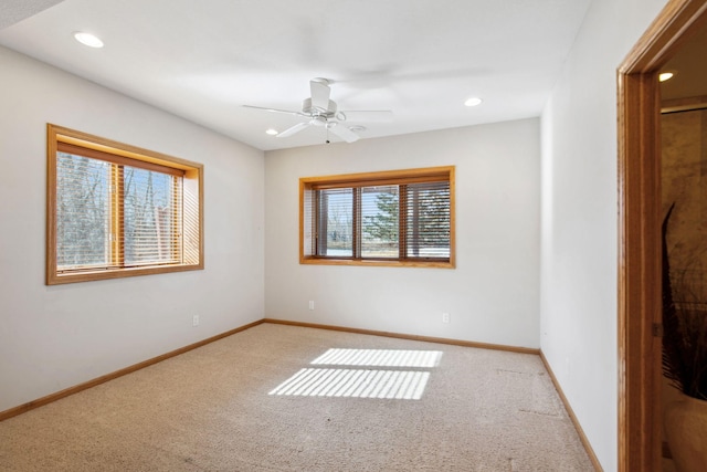 empty room featuring recessed lighting, baseboards, ceiling fan, and carpet flooring