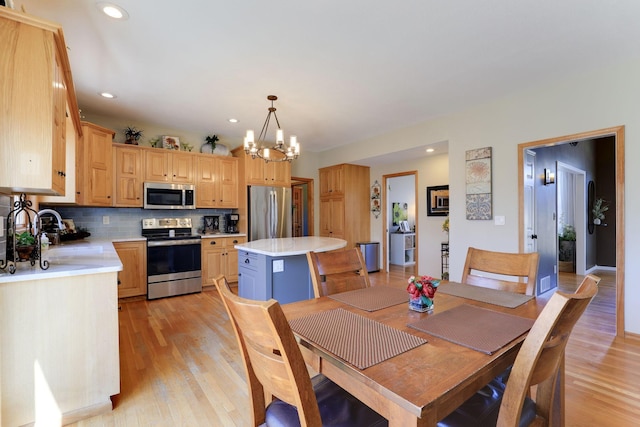 17 Old Deerfield Rd, Ravenna Twp, MN 55089 - dining space featuring a chandelier, light wood-style flooring, and recessed lighting