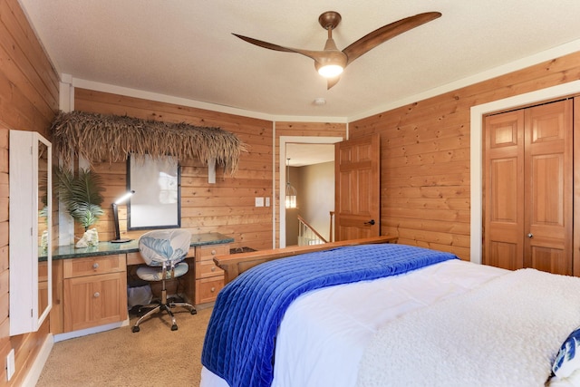 17 Old Deerfield Rd, Ravenna Twp, MN 55089 - bedroom with wood walls, light colored carpet, a closet, and ceiling fan