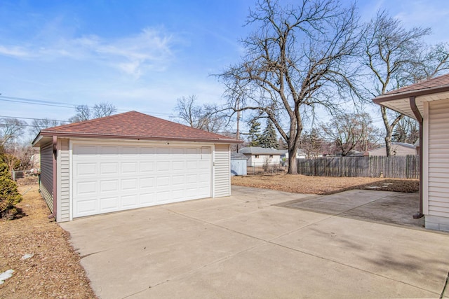 detached garage with fence