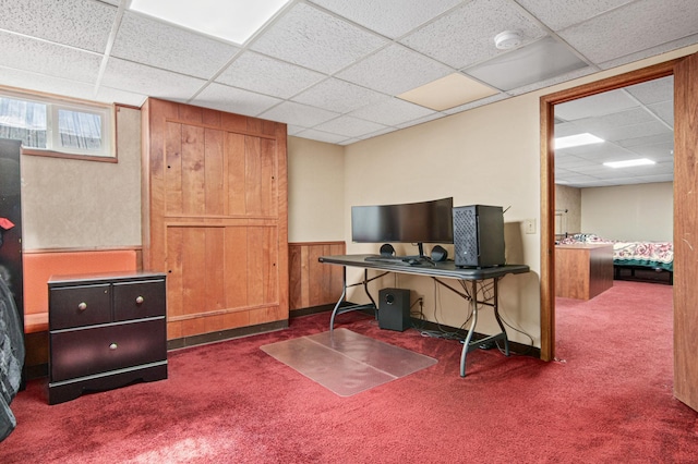 home office featuring a paneled ceiling and carpet floors