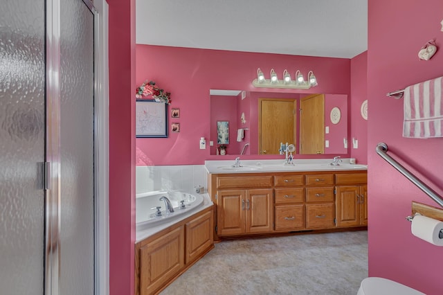 bathroom with a sink, double vanity, a bath, and a shower stall