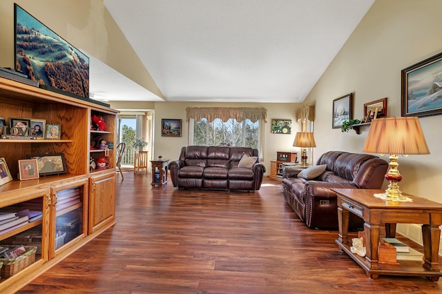 living room featuring a wealth of natural light, high vaulted ceiling, and dark wood-style floors