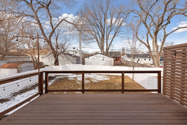 wooden deck with a residential view and fence