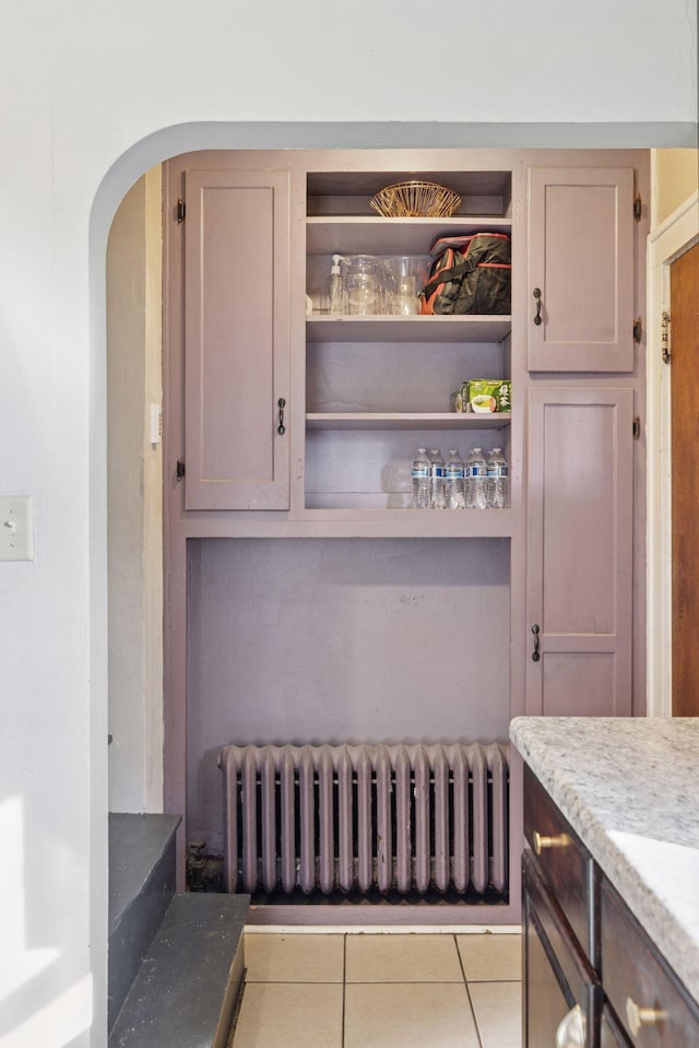 pantry featuring radiator