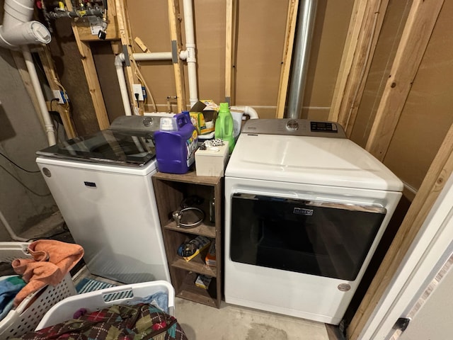 laundry room featuring laundry area and washer and clothes dryer