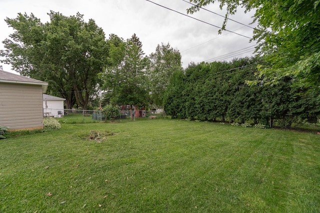 view of yard featuring fence