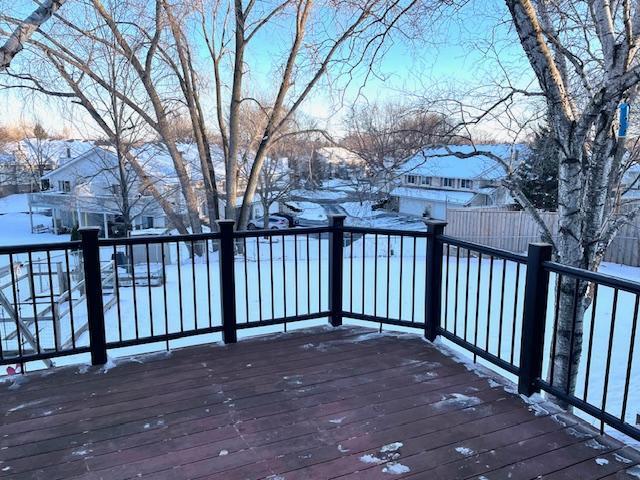 view of snow covered deck