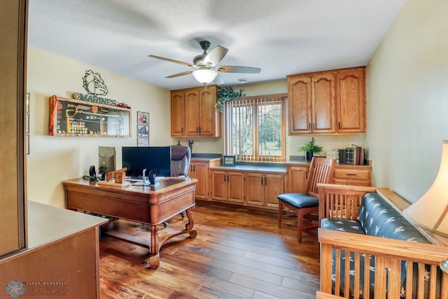 office area featuring ceiling fan and hardwood / wood-style flooring