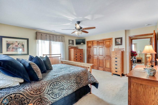 bedroom featuring a closet, carpet, and ceiling fan