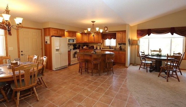 dining space featuring an inviting chandelier, light carpet, light tile patterned floors, and vaulted ceiling