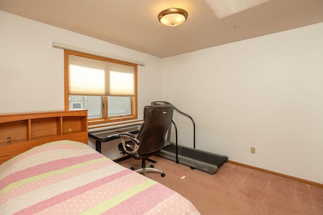 carpeted bedroom with baseboards