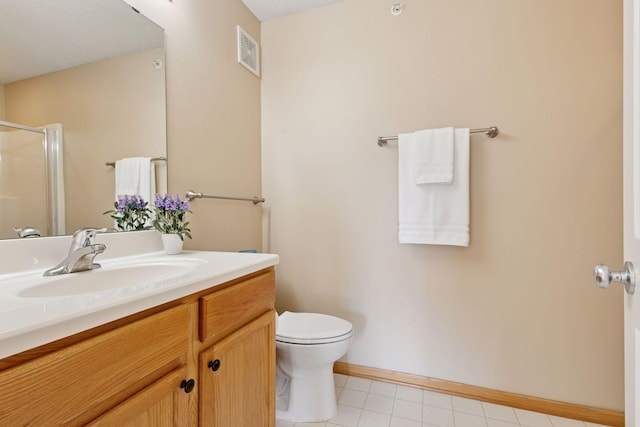 bathroom featuring visible vents, toilet, tile patterned floors, an enclosed shower, and vanity