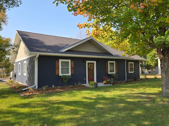 view of front of house with a front lawn