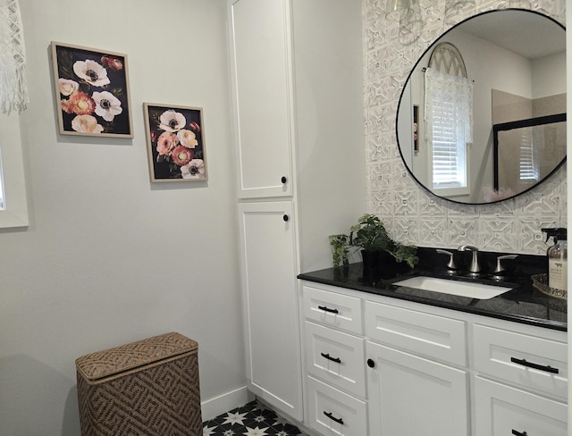 446 Pacific Ave, Hancock, MN 56244 - full bathroom with a shower with shower door, baseboards, and vanity