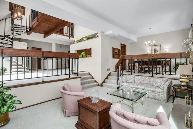 living area featuring stairs, an inviting chandelier, carpet flooring, and baseboards