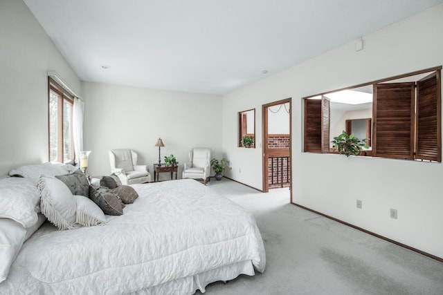 bedroom with carpet flooring and baseboards