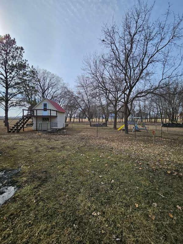 view of yard featuring stairway