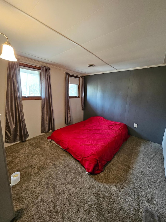 carpeted bedroom with multiple windows and visible vents