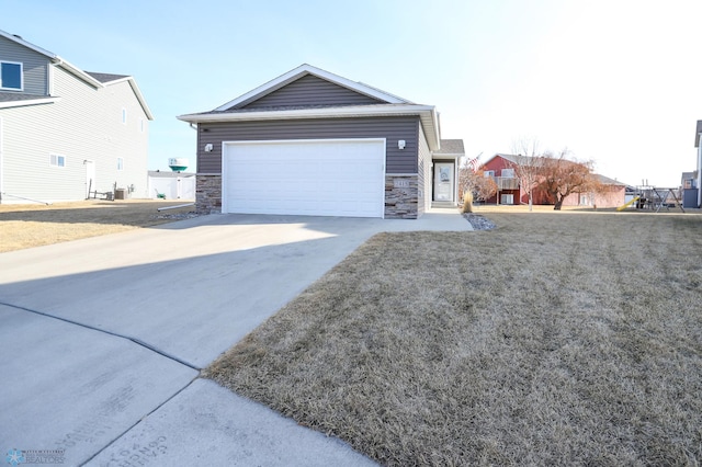 view of front of house with concrete driveway, a garage, stone siding, and central AC