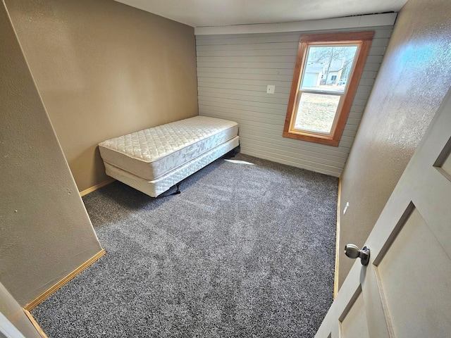 carpeted bedroom with baseboards