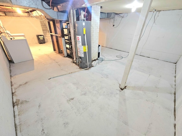 unfinished below grade area featuring gas water heater