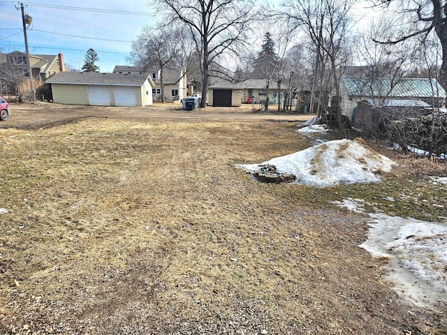 view of yard with a garage