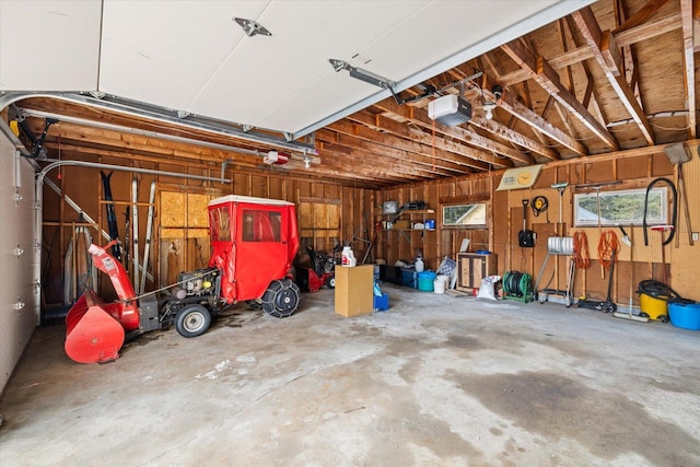 garage featuring a garage door opener