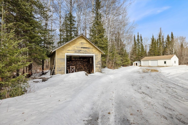 exterior space with a detached garage