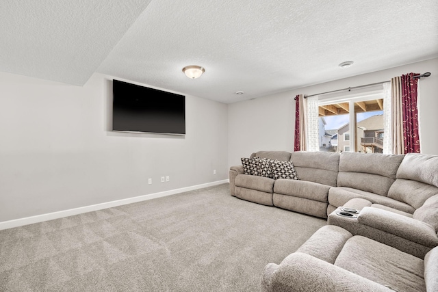 carpeted living room with baseboards and a textured ceiling