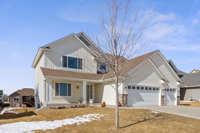 view of front of house with an attached garage and driveway