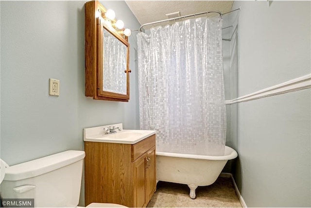 full bathroom with toilet and vanity