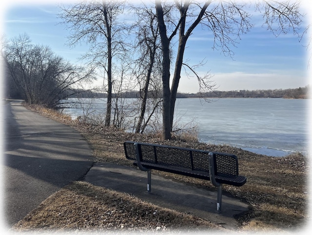 view of property's community featuring a water view