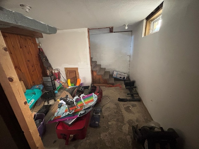 basement with a textured ceiling