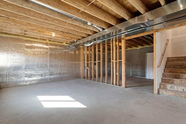 unfinished basement with stairs