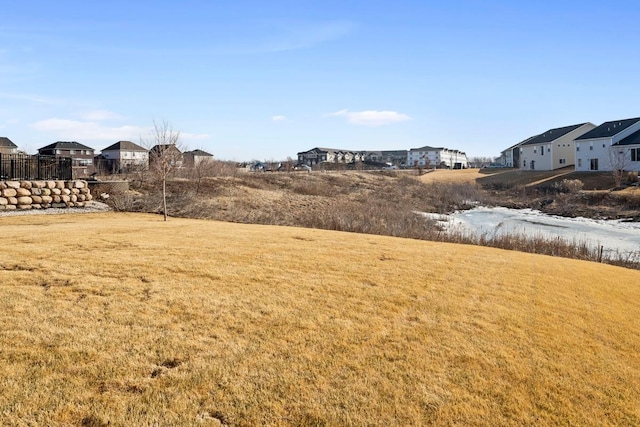 view of yard with a residential view