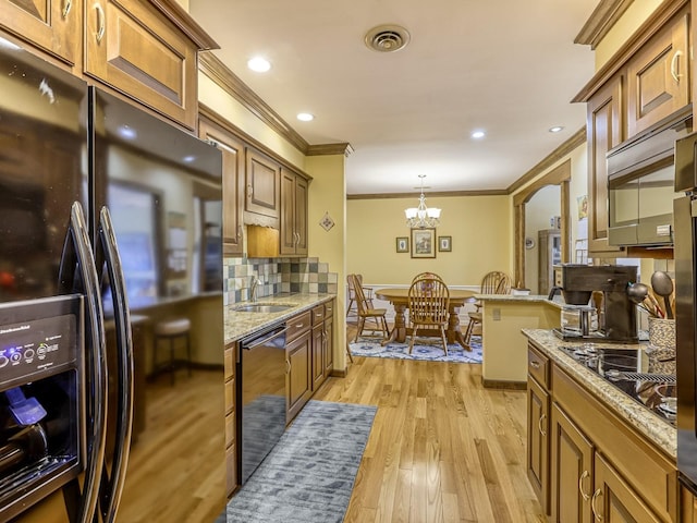 8621 Basswood Rd Unit 33, Eden Prairie, MN 55344 - kitchen with visible vents, black appliances, ornamental molding, and a sink