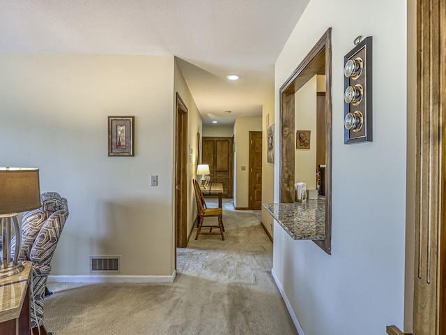 8621 Basswood Rd Unit 33, Eden Prairie, MN 55344 - corridor featuring light carpet, baseboards, visible vents, and recessed lighting