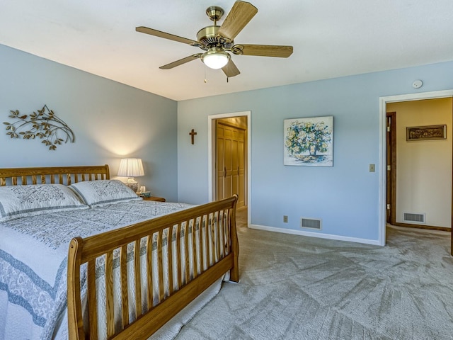8621 Basswood Rd Unit 33, Eden Prairie, MN 55344 - carpeted bedroom with baseboards, visible vents, and a ceiling fan